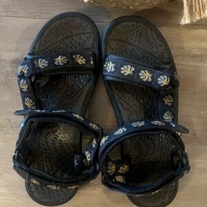 Teva Women's Black Hurricane Sandals with Yellow Floral Design